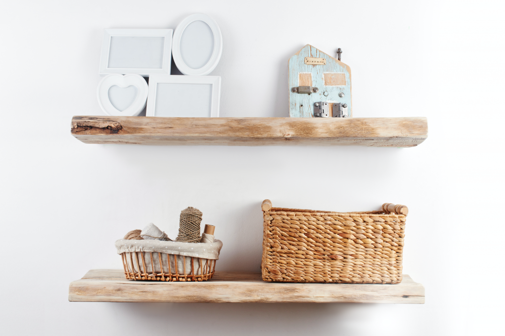 Wooden shelves can add interest to any room and provide a surface for extra ornaments and photo frames
